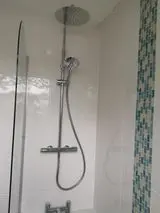 Walk-in shower enclosure fitted by APG Plumbing & Heating Services Ltd in Cannock