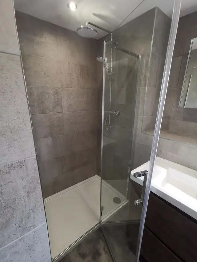 Heated chrome towel rail installed by APG Plumbing & Heating Services Ltd, Staffordshire