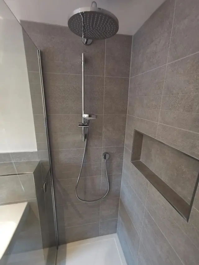 Safety grab rails and compliant bathroom fittings installed by APG Plumbing & Heating Services Ltd for a landlord property in Cannock