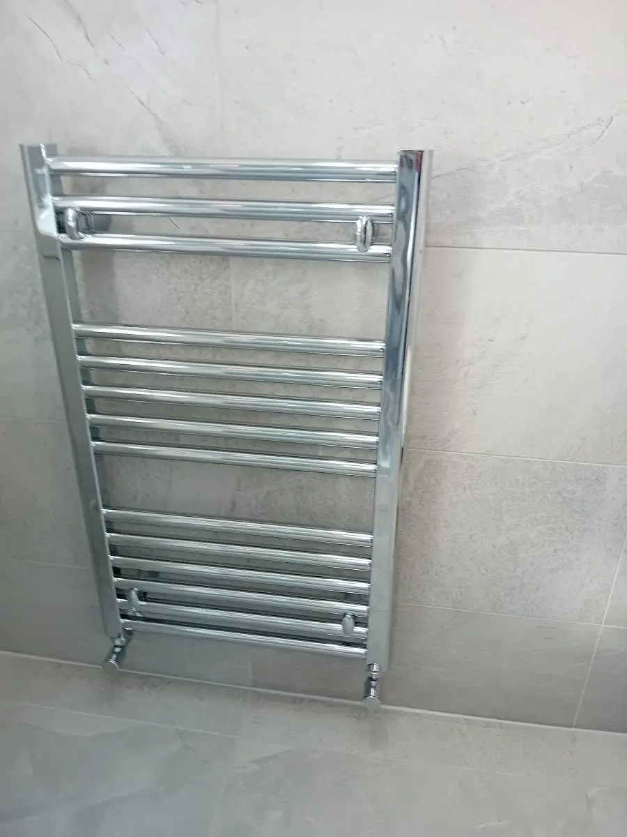 Heated towel rail installed as part of an energy-efficient heating system by APG Plumbing & Heating Services Ltd in Cannock